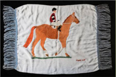 Ada Whitmore carefully embroidered this cushion cover to commemorate Phar Lap after his Melbourne Cup win in 1930.