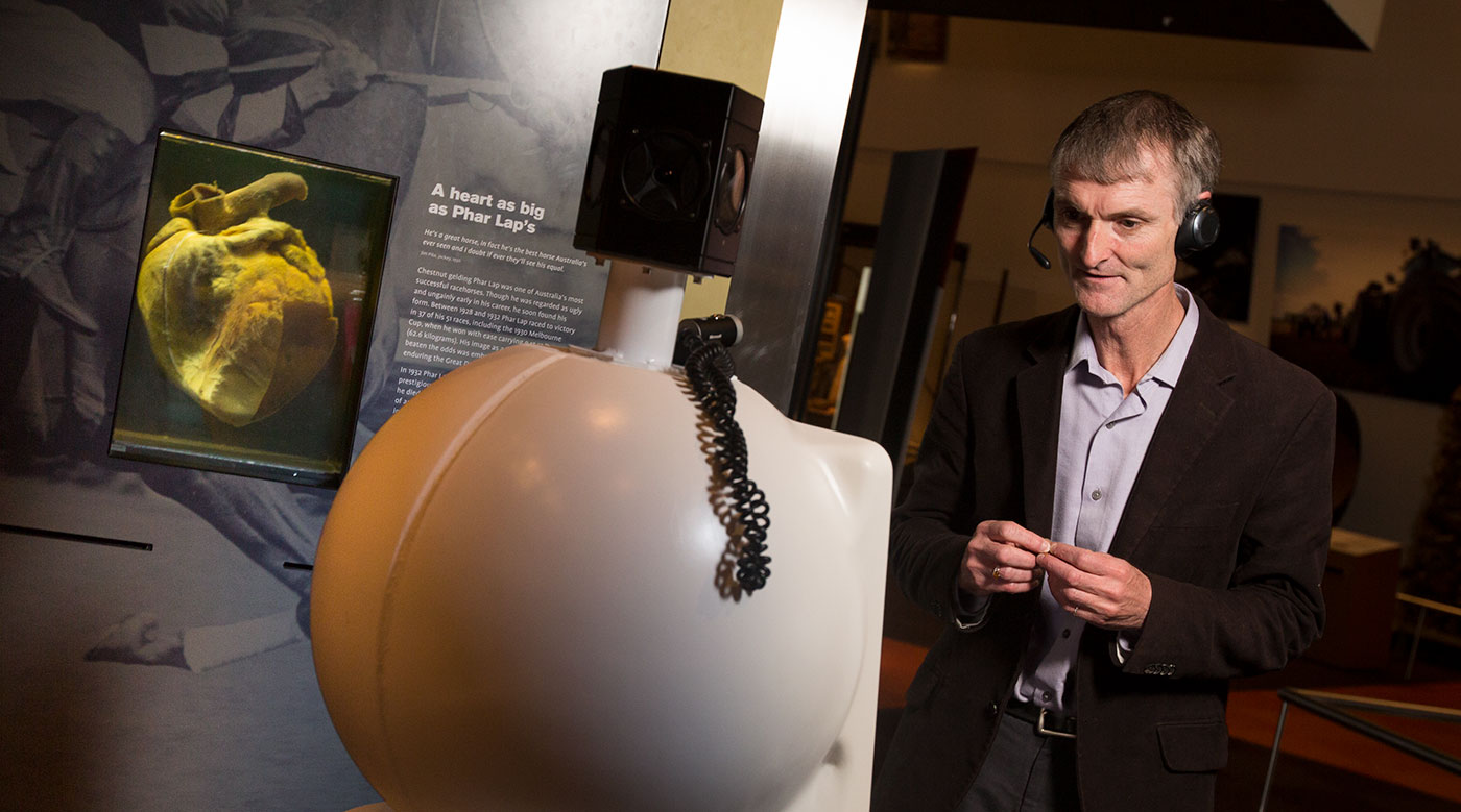 Robert Bunzli with a Museum robot.